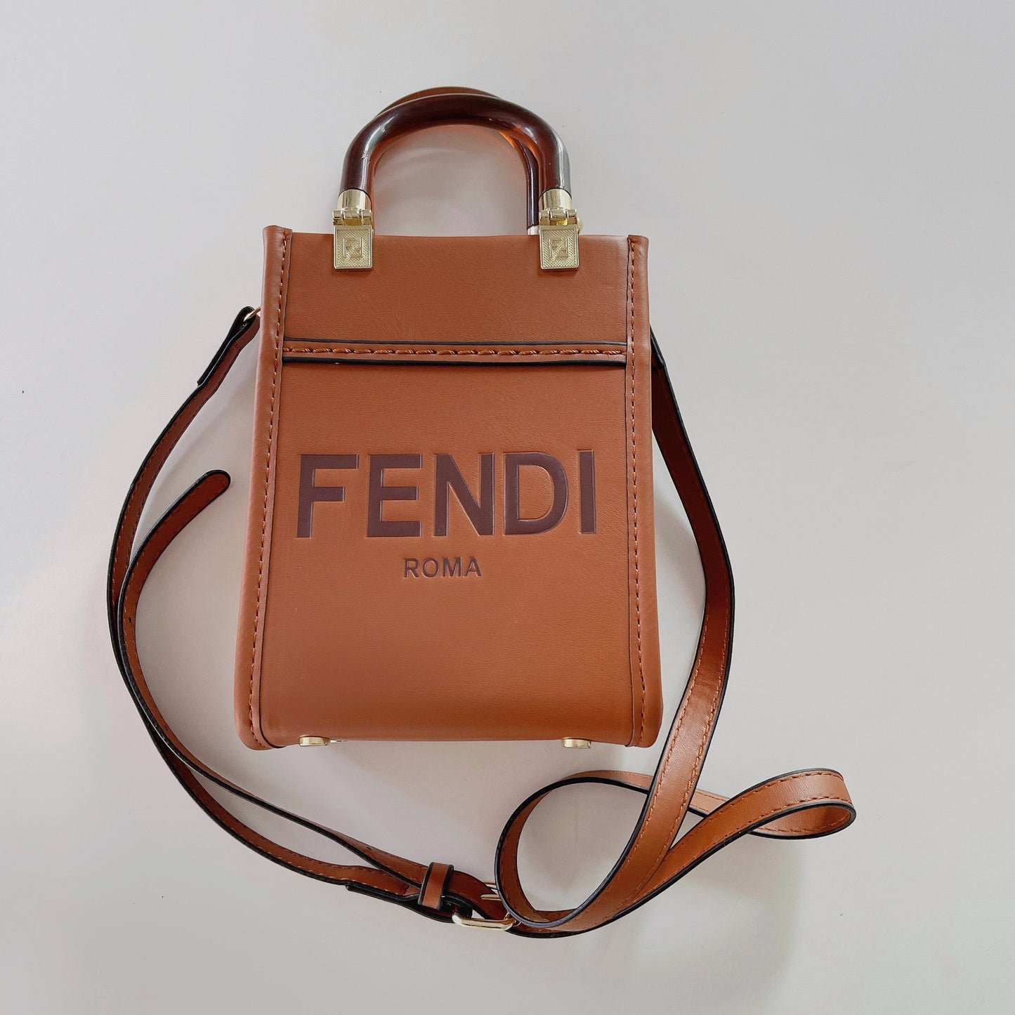 Klassisk totepose med stropp for crossbody