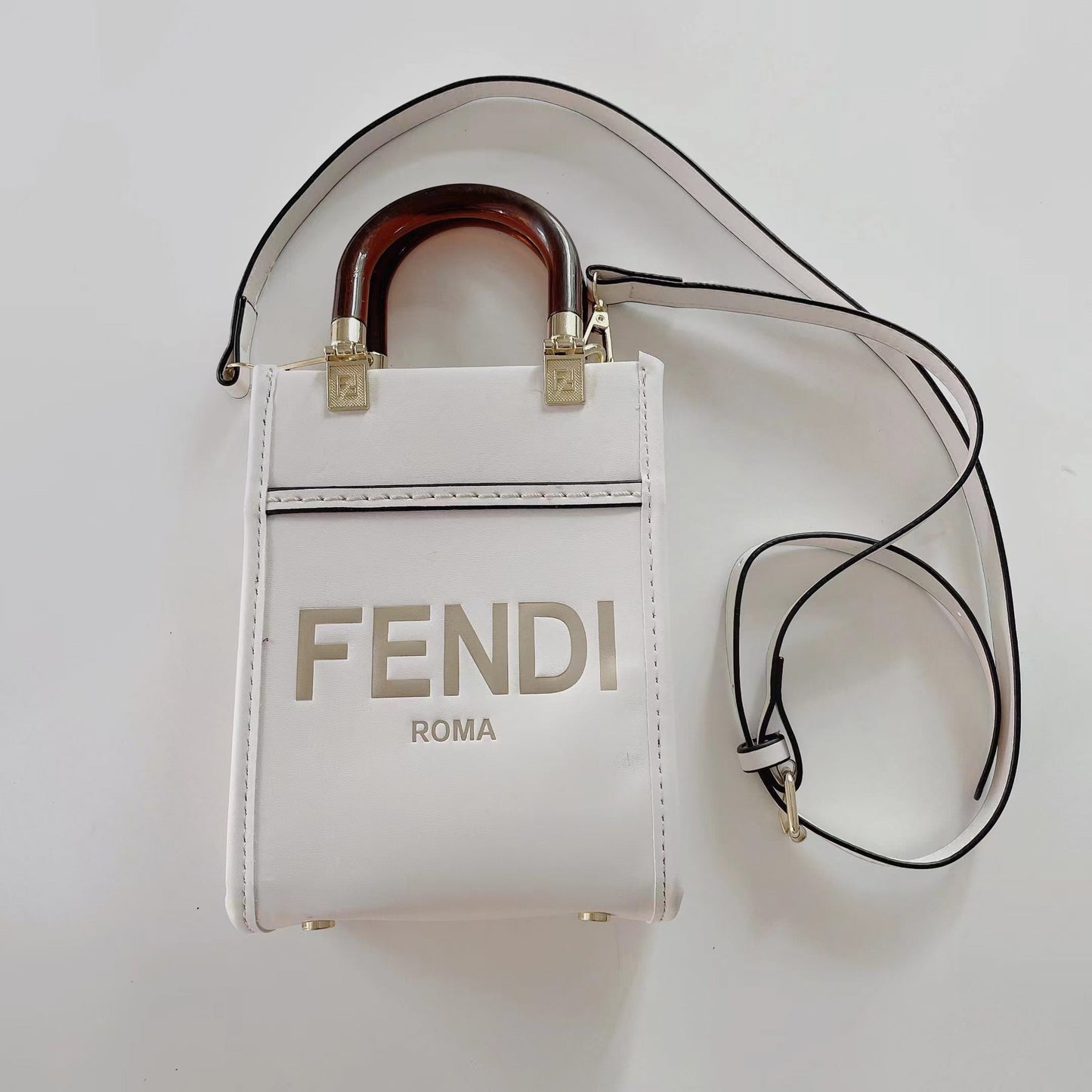 Klassisk totepose med stropp for crossbody
