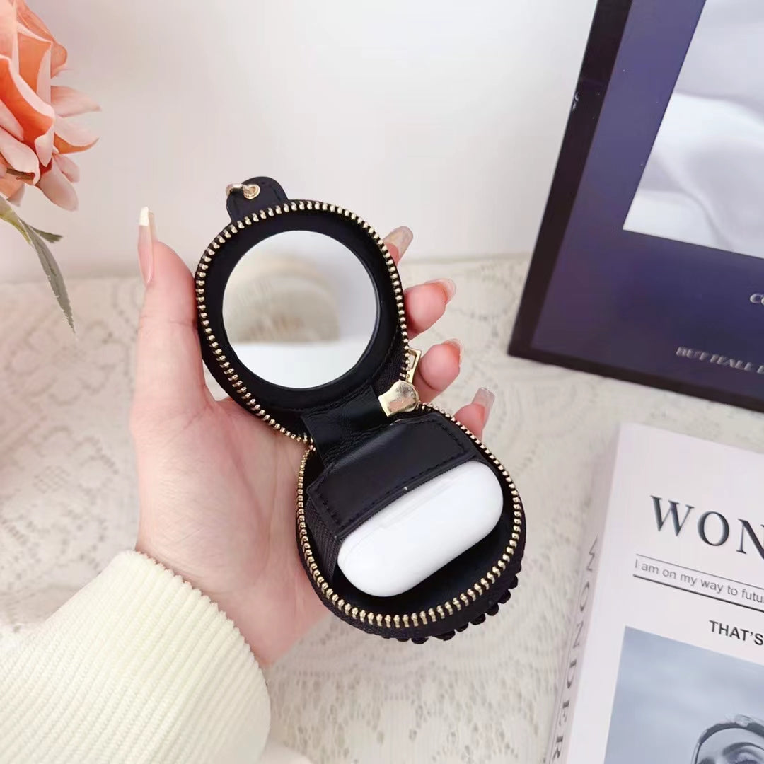 Luksuriøse Chanel AirPods -sak med speil