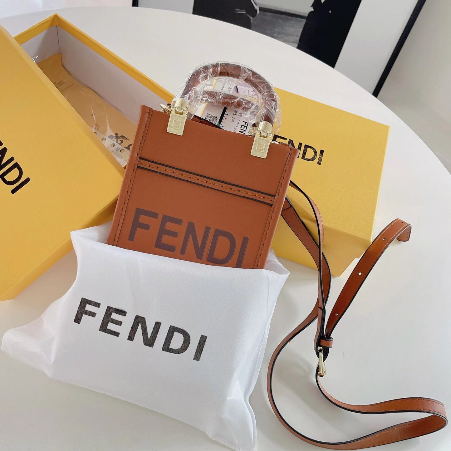 Klassisk totepose med stropp for crossbody