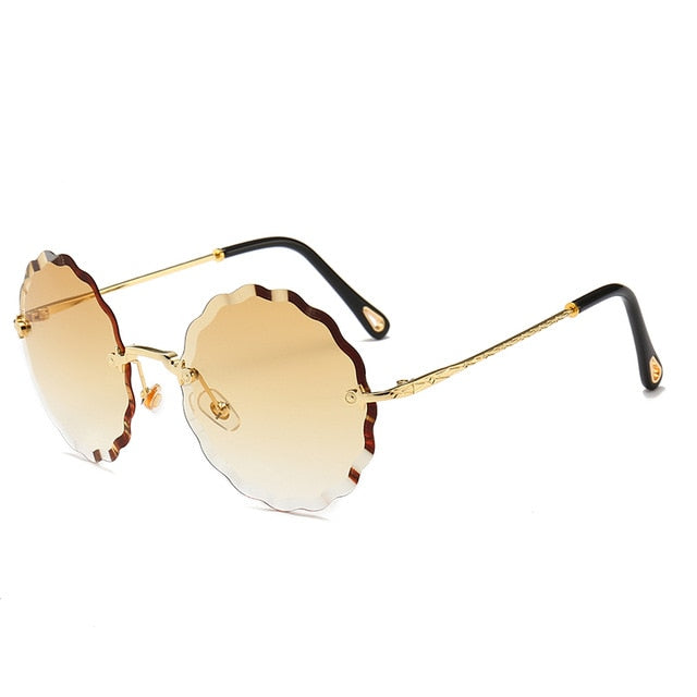 Luksuriøse runde solbriller kvinner merkevaredesigner rimless solglass for kvinnelig fargetone mote rosie briller