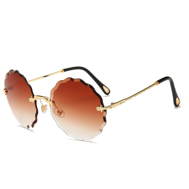 Luksuriøse runde solbriller kvinner merkevaredesigner rimless solglass for kvinnelig fargetone mote rosie briller