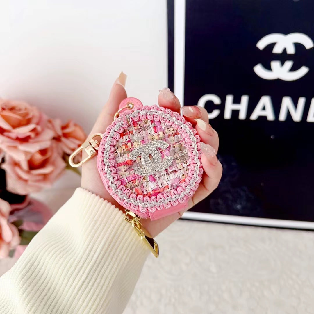 Luksuriøse Chanel AirPods -sak med speil