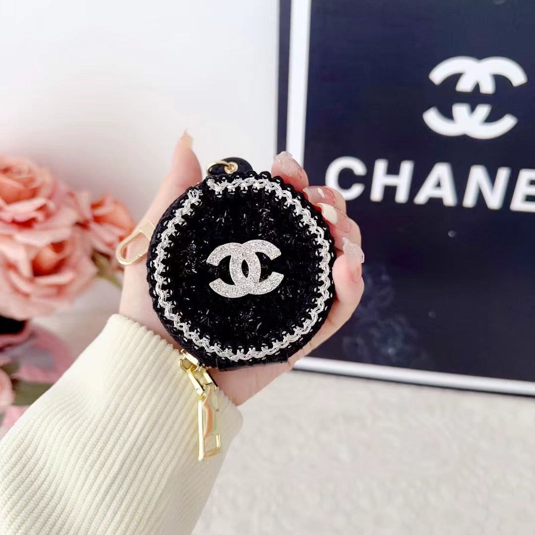 Luksuriøse Chanel AirPods -sak med speil