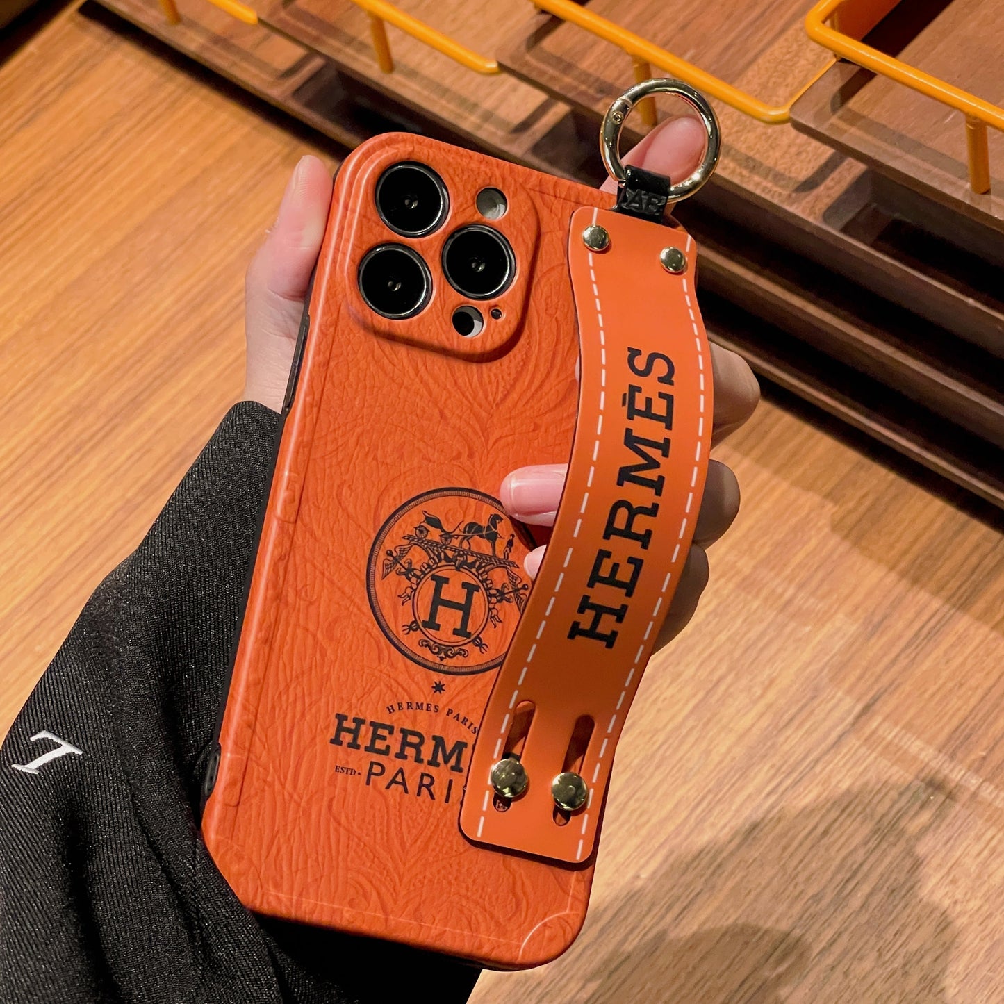 H armbånd iPhone -saken